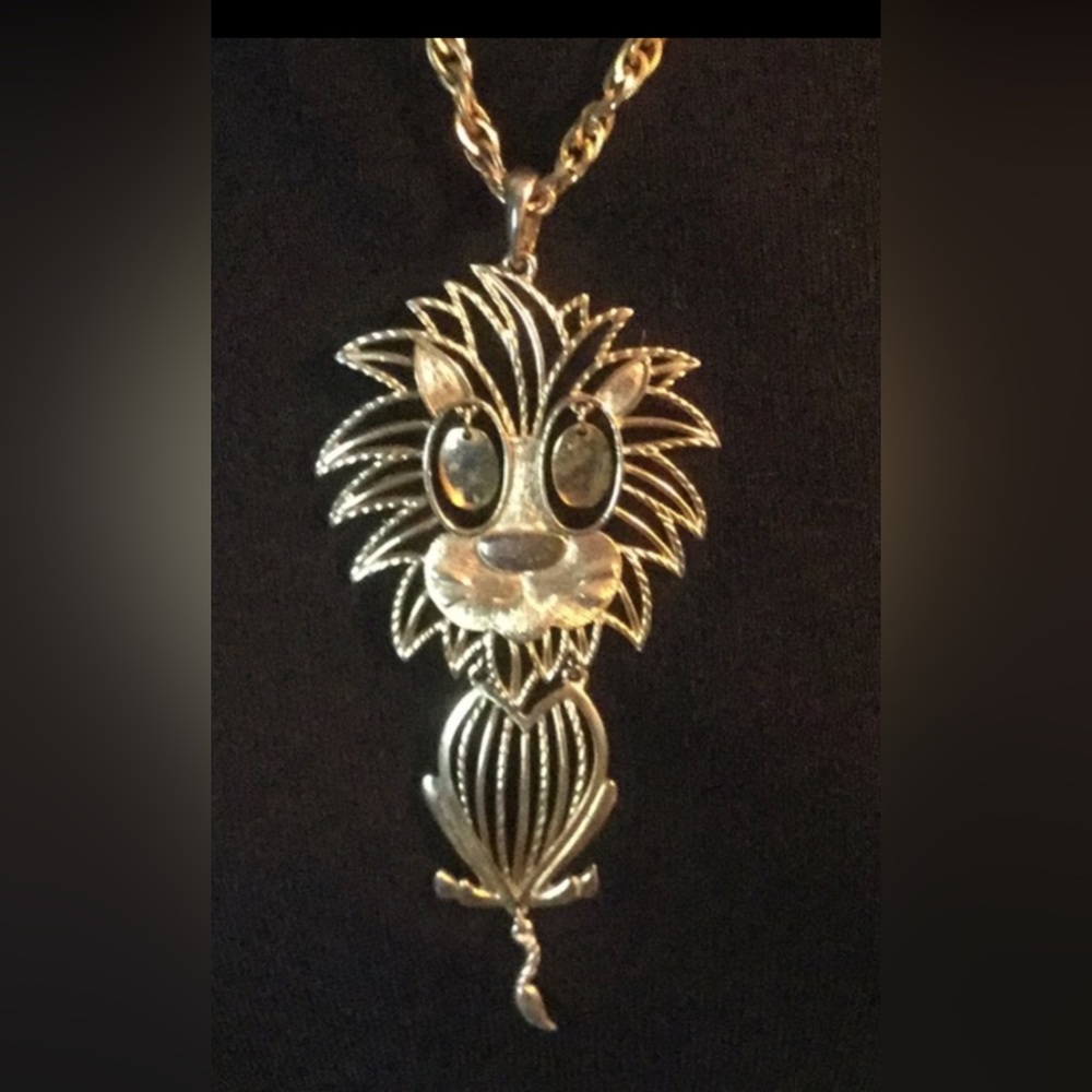 Vintage gold colored lion necklace by Alan